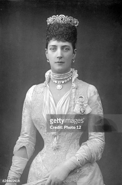 Alexandra Queen Consort of Edward VII of Great Britain, when Princess of Wales. Photograph published c1890. Woodburytype, London.