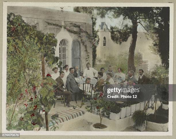 Photographic print, hand-coloured showing families belonging to the American colony in Palestine , circa 1900.