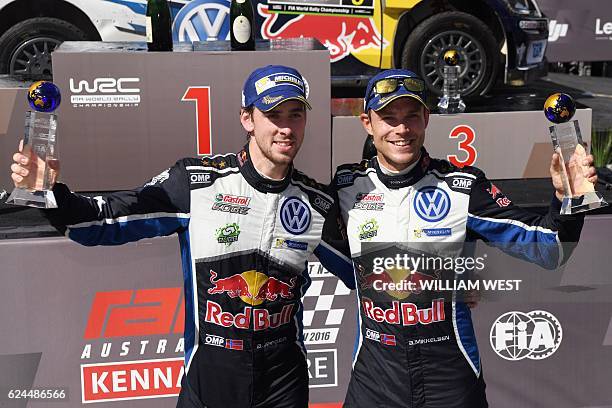 Driver Andreas Mikkelsen of Norway celebrates with co-driver Anders Jaeger Synnevag after winning the Rally Australia in their Volkswagen Polo WRC...