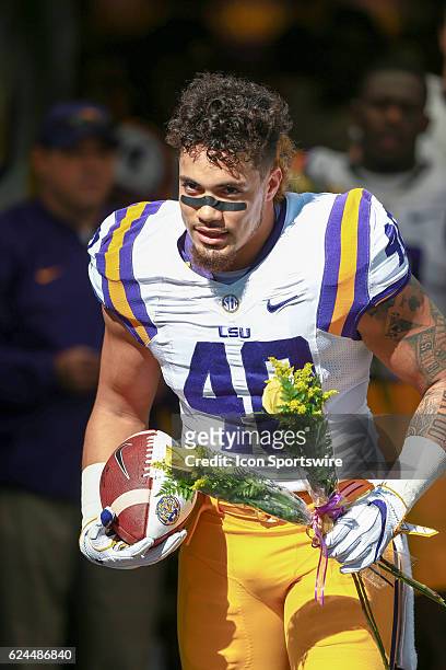 Tigers linebacker Duke Riley runs on the field as a senior in his final home game during the game between the Florida Gators and the LSU Tigers on...