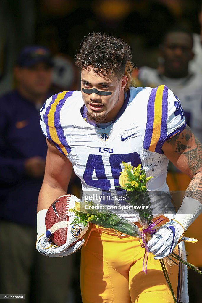 Duke Riley Ig LSU Tigers linebacker Duke Riley runs on the field as a senior in his ...