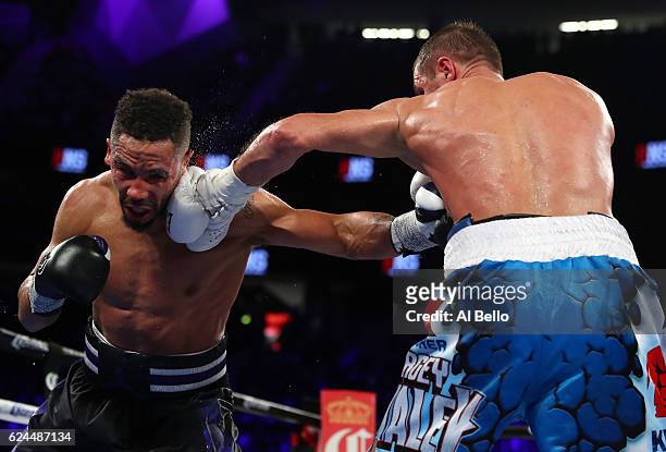 Sergey Kovalev of Russia lands a left to the head of Andre Ward during their light heavyweight title bout at T-Mobile Arena on November 19, 2016 in...