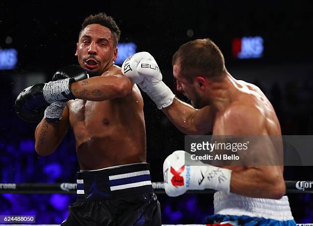 Andre Ward and Sergey Kovalev exchange punches during their WBO/IBF/WBA Light Heavyweight Championship fight at T-Mobile Arena on November 19, 2016...