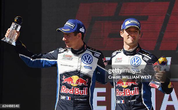 Driver Sebastien Ogier of France and co-driver Julien Ingrassia celebrate after finishing second in the Rally Australia in a Volkswagen Polo WRC car...