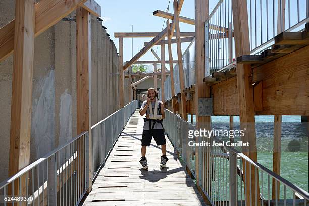 rollerblading with broken arm in lyon, france - digital summr in lyon stock pictures, royalty-free photos & images