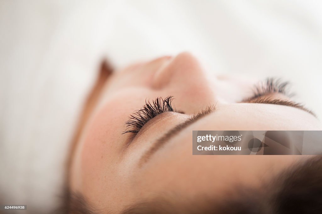 Woman lying in beauty esthetic