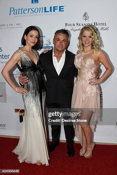 Emmanuelle Vaugier, Mark Zunino, and Crystal Hunt attend the Talk Of The Town Gala at The Beverly Hilton Hotel on November 19, 2016 in Beverly Hills,...