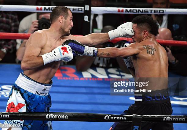 Sergey Kovalev hits Andre Ward with a left in the second round of their light heavyweight championship bout at T-Mobile Arena on November 19, 2016 in...