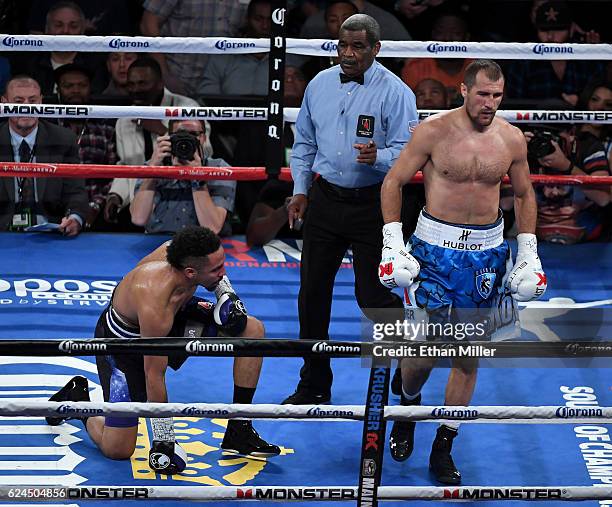 Referee Robert Byrd gives a count to Andre Ward after he was knocked down by Sergey Kovalev in the second round of their light heavyweight...