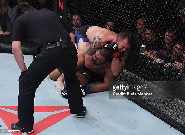 Ryan Bader of the United States attempts to submit Antonio Rogerio Nogueira of Brazil during their light heavyweight bout at UFC Fight Night Bader v...