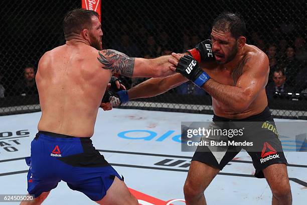 Ryan Bader of the United States and Antonio Rogerio Nogueira of Brazil exchange punches during their light heavyweight bout at UFC Fight Night Bader...