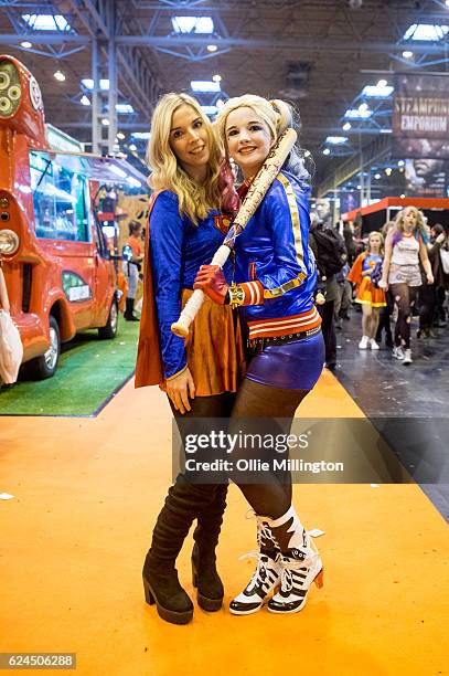 Cosplayers dressed as Supergirl and Harley Quinn during day 1 of the November Birmingham MCM Comic Con at the National Exhibition Centre in...