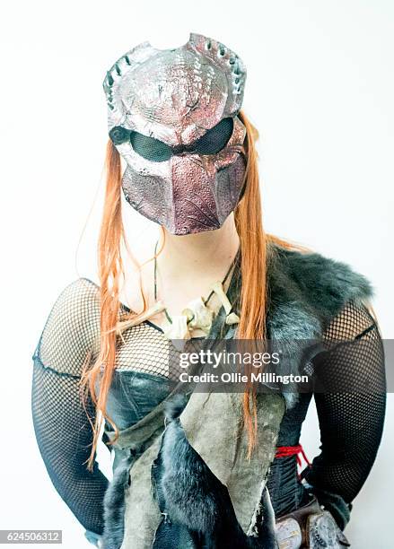 Cosplayer dressed as a Predator during day 1 of the November Birmingham MCM Comic Con at the National Exhibition Centre in Birmingham, UK on November...