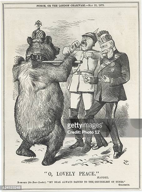 The Russian Bear dancing to Germany's tune of_'O, Lovely Peace' by Handel played on the tin whistle by Bismarck. Cartoon by John Tenniel from...