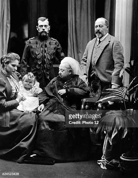 Photograph of Tsar Nicholas II, Empress Alexandra Fedorovna, Grand Duchess Olga, Queen Victoria, and Edward, Prince of Wales taken in Balmoral castle...
