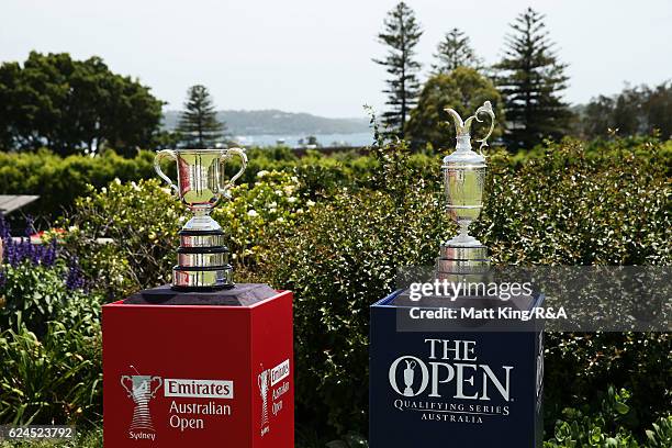 The Claret Jug stands next to the Australian Open trophy at the first tee during day four of the 2016 Australian Open at Royal Sydney Golf Club on...