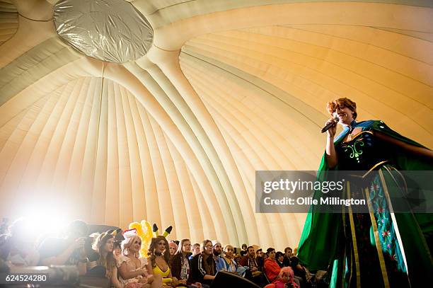 Cosplayer dressed as Anna from Frozen during day 1 of the November Birmingham MCM Comic Con at the National Exhibition Centre in Birmingham, UK on...