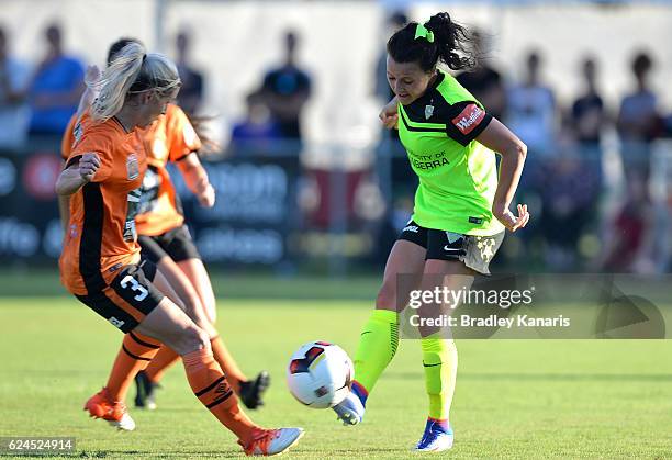 Hayley Raso of Canberra takes on the defence during the round three W-League match between the Brisbane Roar and Canberra United at AJ Kelly Field on...