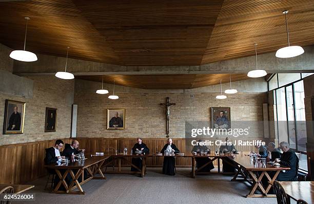 Benedictine monks eat lunch in silence before during a day of reflections on the Jubilee Year of Mercy and before the sealing of the Holy Door at...