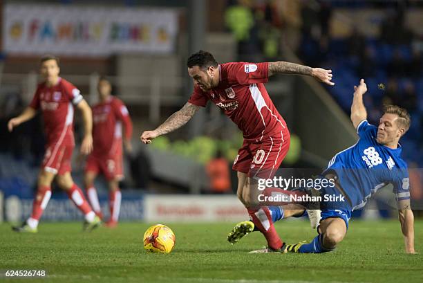 November 19: Lee Tomlin of Bristol City and Stephen Gleeson of Birmingham City in action during the Sky Bet Championship match between Birmingham...