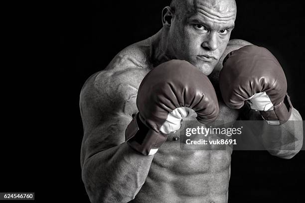 muscular boxer - belly punching stock pictures, royalty-free photos & images