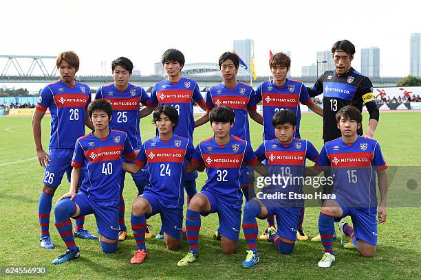 Players of FC Tokyo U-23 line up for team photos prior to the J.League third division match between FC Tokyo U-23 and Cerezo Osaka U-23 at...