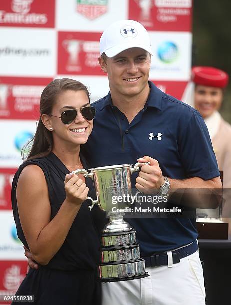 Jordan Spieth of the United States and girlfriend Annie Verret pose with the Stonehaven trophy after winning the 2016 Australian Open during day four...