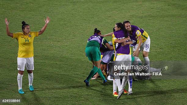 Brazil players celebrate after winning the FIFA U-20 Women's World Cup, Group A match between Brazil and Sweden at PNG Football Stadium on November...