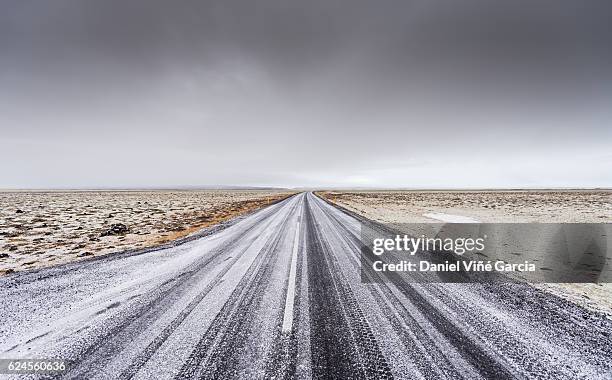 snow covered view of highway 1, skaftafell, south east iceland - skaftafell fotografías e imágenes de stock