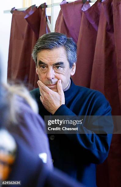 Former French Prime Minister and presidential candidate hopeful Francois Fillon votes during the first round of voting in the Republican Party's...