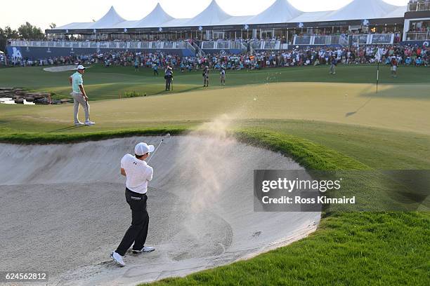 Matt Fitzpatrick of England hits his third shot on the 18th hole during day four of the DP World Tour Championship at Jumeirah Golf Estates on...