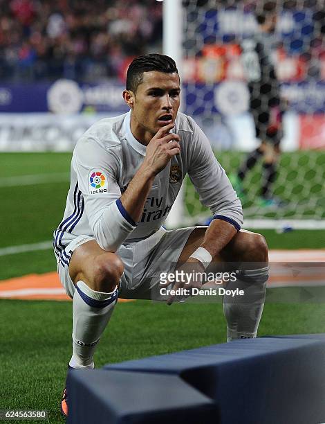 Cristiano Ronaldo of Real Madrid CF celebrates in front of a tv camera after scoring his 2nd goal against Club Atletico de Madrid at Vicente Calderon...