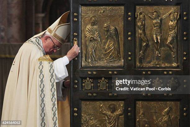 Pope Francis closes the Holy Door of St. Peter's Basilica during the closing mass of the Extraordinary Jubilee of Mercy, at The Vatican on November...