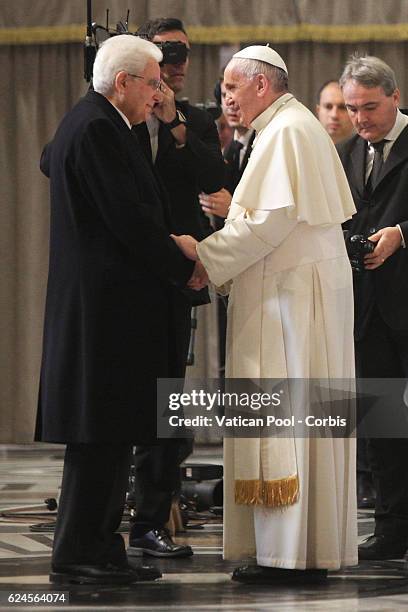 Italy's President Sergio Mattarella greets Pope Francis during the closing ceremony of the Holy Door of St. Peter's Basilica, marking the end of the...