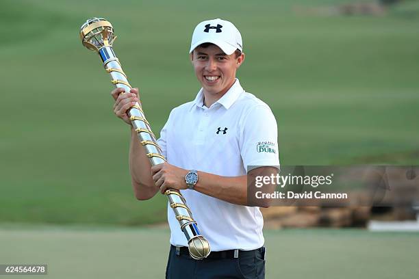 Matt Fitzpatrick of England poses with the trophy following his victory during day four of the DP World Tour Championship at Jumeirah Golf Estates on...