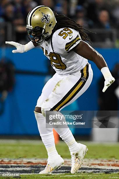 Dannell Ellerbe of the New Orleans Saints celebrates after sacking Cam Newton of the Carolina Panthers at Bank of America Stadium on November 17,...