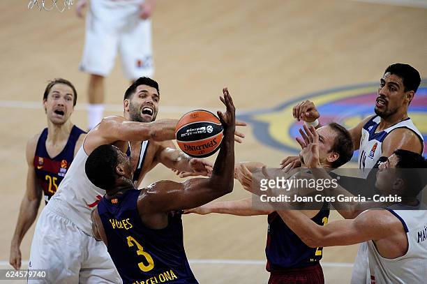 Jonathan Holmes and Brad Oleson of F.C Barcelona Lassa, fighting for the ball with Felipe Reyes of Real Madrid during the basketball Turkish Airlines...