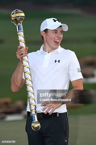 Matt Fitzpatrick of England poses with the trophy following his victory during day four of the DP World Tour Championship at Jumeirah Golf Estates on...