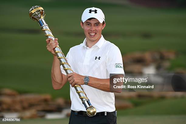 Matt Fitzpatrick of England poses with the trophy following his victory during day four of the DP World Tour Championship at Jumeirah Golf Estates on...