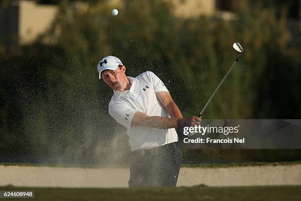 Matt Fitzpatrick of England hits from a bunker on the 17th hole during day four of the DP World Tour Championship at Jumeirah Golf Estates on...