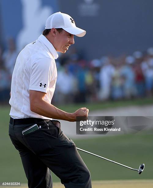 Matthew Fitzpatrick of England celebrates after holing the winning putt to win the DP World Tour Championship during the final round of the DP World...