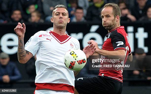 Guingamp's French midfielder Etienne Didot challenges Bordeaux's French forward Jeremy Menez during the French L1 football match between Guingamp and...