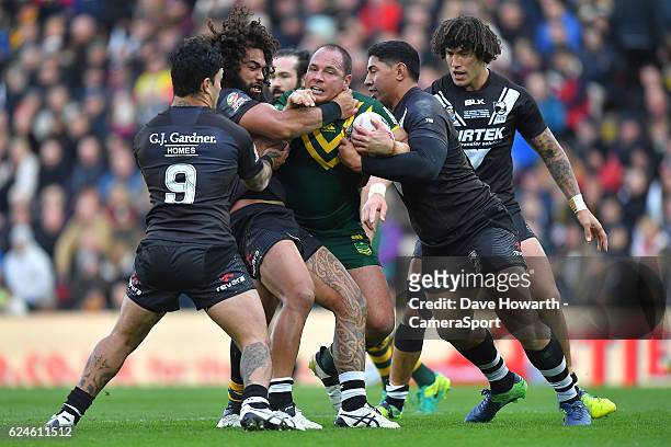 Australia's Matthew Scott takes on the New Zealand defence during the Four Nations match between the New Zealand Kiwis and Australian Kangaroos at...