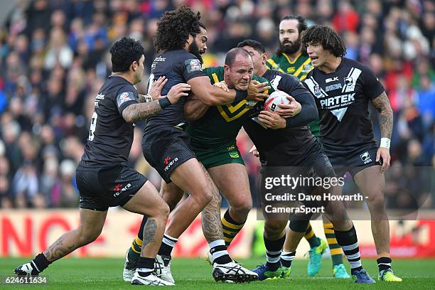 Australia's Matthew Scott takes on the New Zealand defence during the Four Nations match between the New Zealand Kiwis and Australian Kangaroos at...