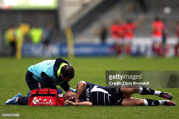 Peter Stringer of Sale Sharks receives treatment during the Aviva Premiership match between Sale Sharks and Saracens at the AJ Bell Stadium on...
