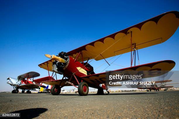 Vintage Travel Air 2000 biplane sits on the runway on November 20, 2016 in Khartoum airport during the Vintage Air Rally . - A dozen biplanes from...