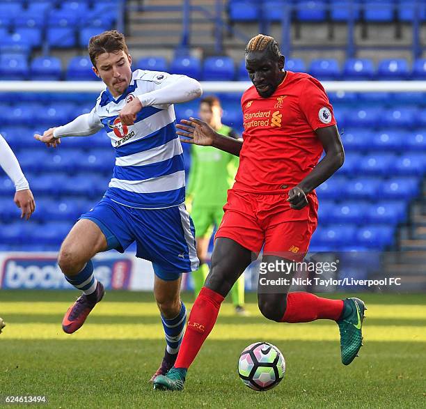 Mamadou Sakho of Liverpool and Andrija Novakovich of Reading in action during the Liverpool v Reading Premier League 2 game at Prenton Park on...