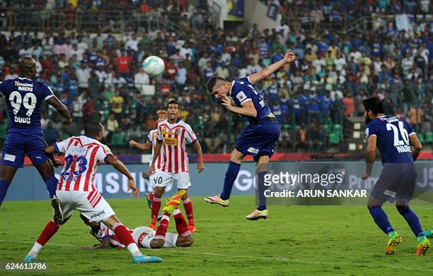 Chennaiyin FC forward Davide Succi heads the ball towards the goal during the Indian Super League football match between Chennaiyin FC and Atletico...