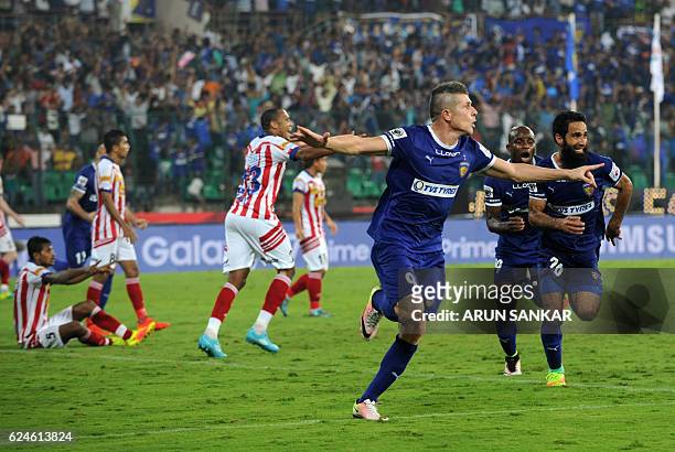 Chennaiyin FC Forward Davide Succi celebrates after scoring a goal against Atletico De Kolkata during the Indian Super League football match between...