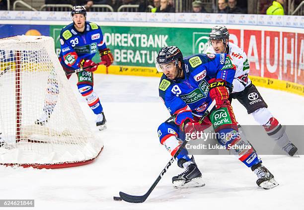 Alexander Barta , Brandon Yip of Duesseldorf and Corey Potter of Koeln in action during the DEL match between Duesseldorfer EG and Koelner Haie at...